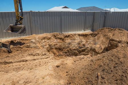 Préparation du terrain pour l'installation du bassin